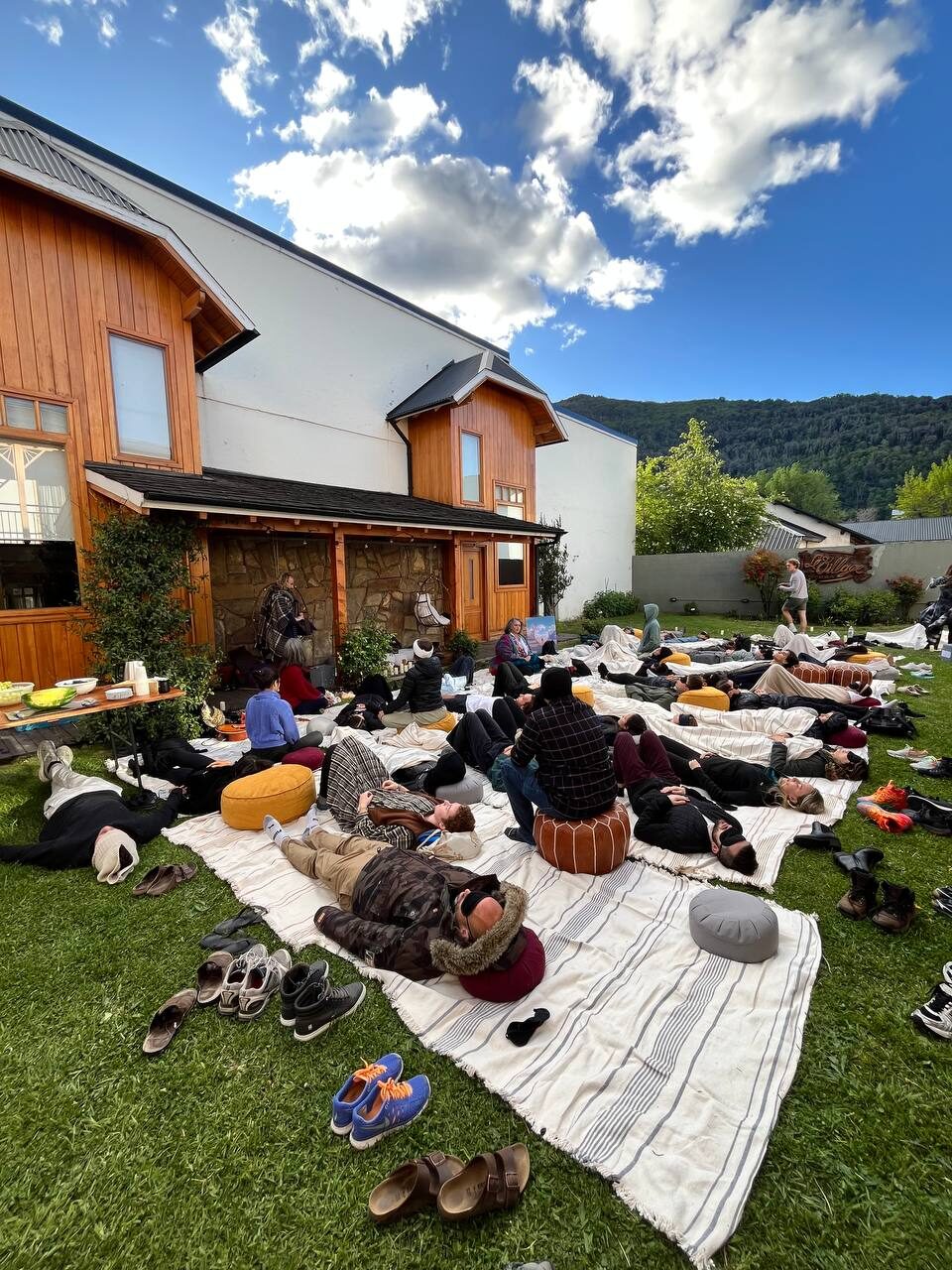 Edge City 2025 — a group resting in a Beacon session